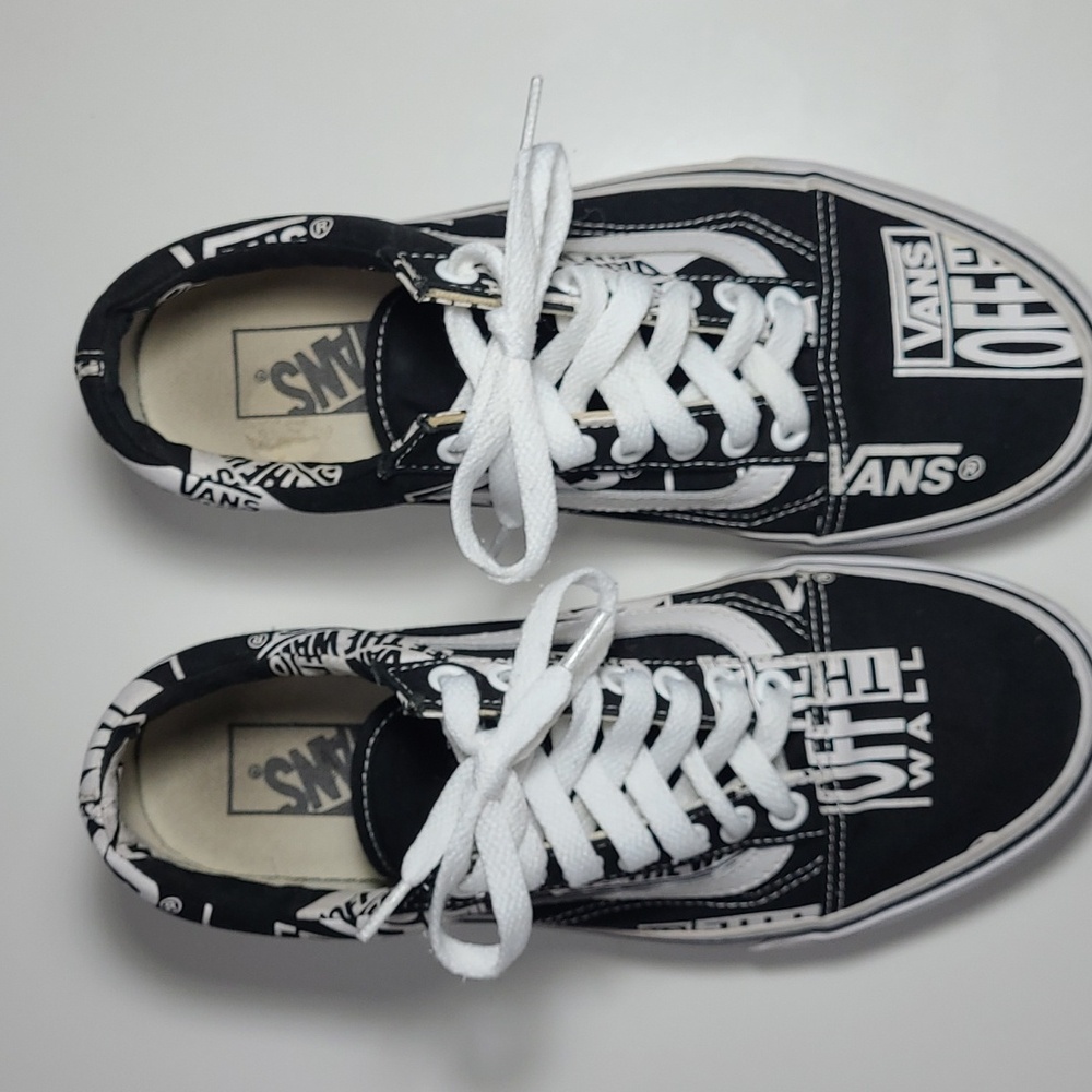 Vans womens off the wall Logo all over Black and White used in good cond.8 1/2